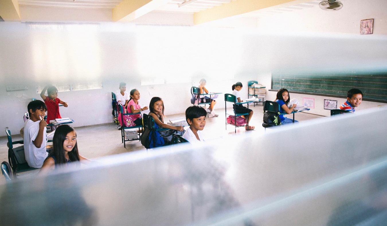 A classroom of kids in a school overseas