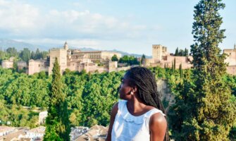 Somto from Somto Seeks enjoying the lovely views of Granada in Spain (in use)