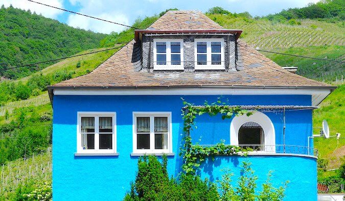 A blue house in the hills