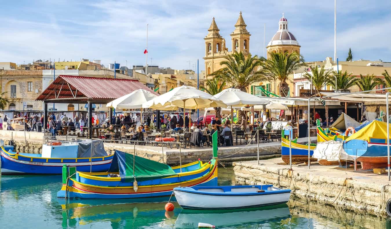 Boats on the water near the shore of Valletta, Malta
