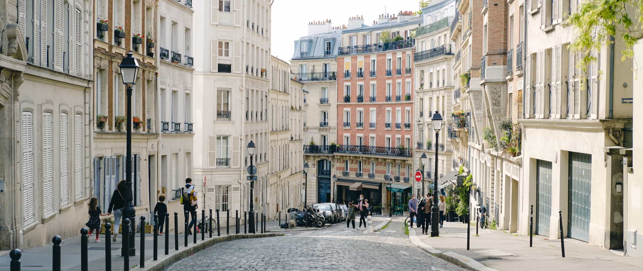 A quiet street and old apartment buildings in Paris, France